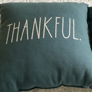 Two Rae Dunn  throw pillows